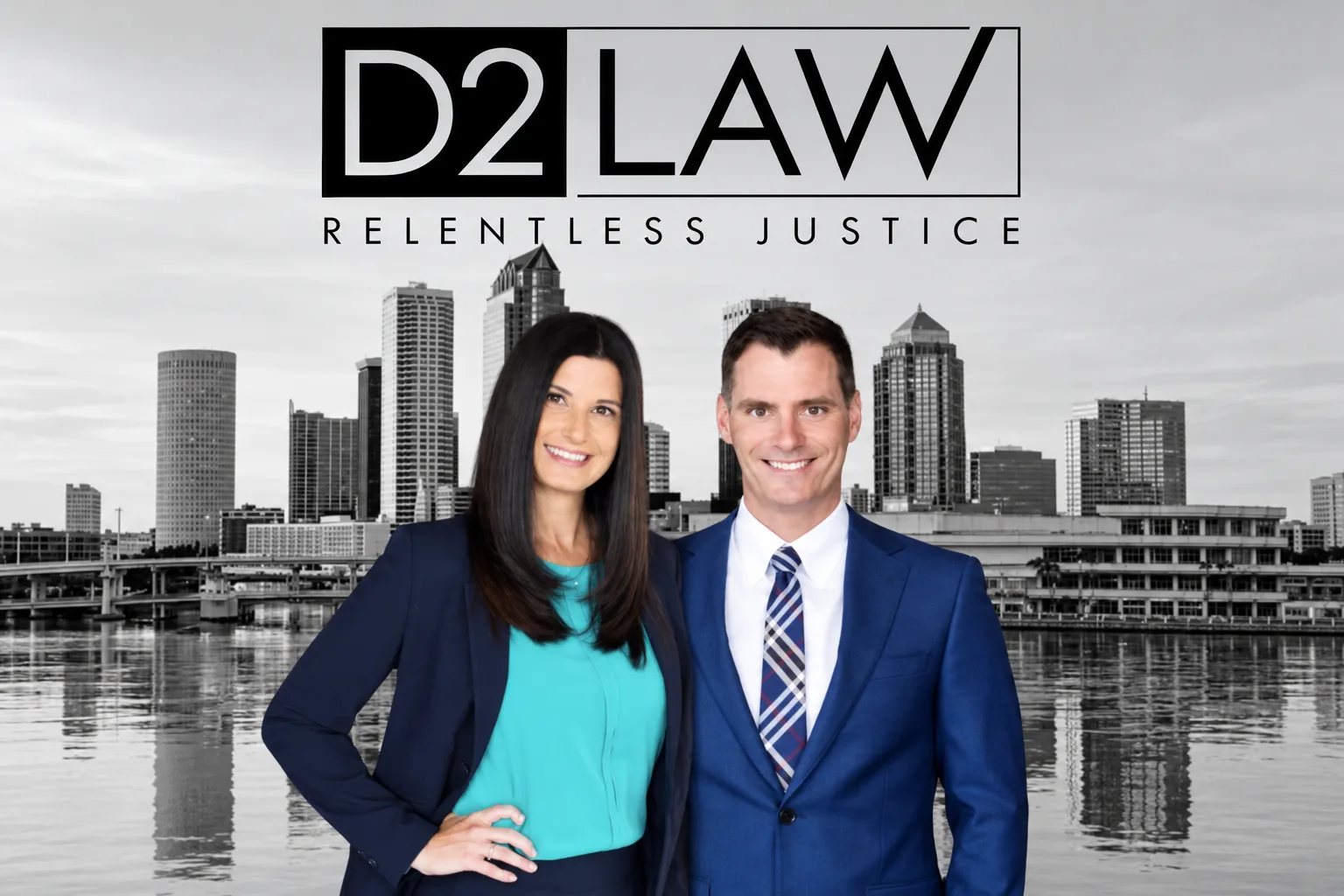 D2 Law attorneys Nicole and Christian Denmon with the Tampa skyline